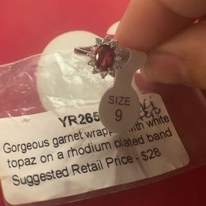 Size 9 Garnet wrapped with white topaz
